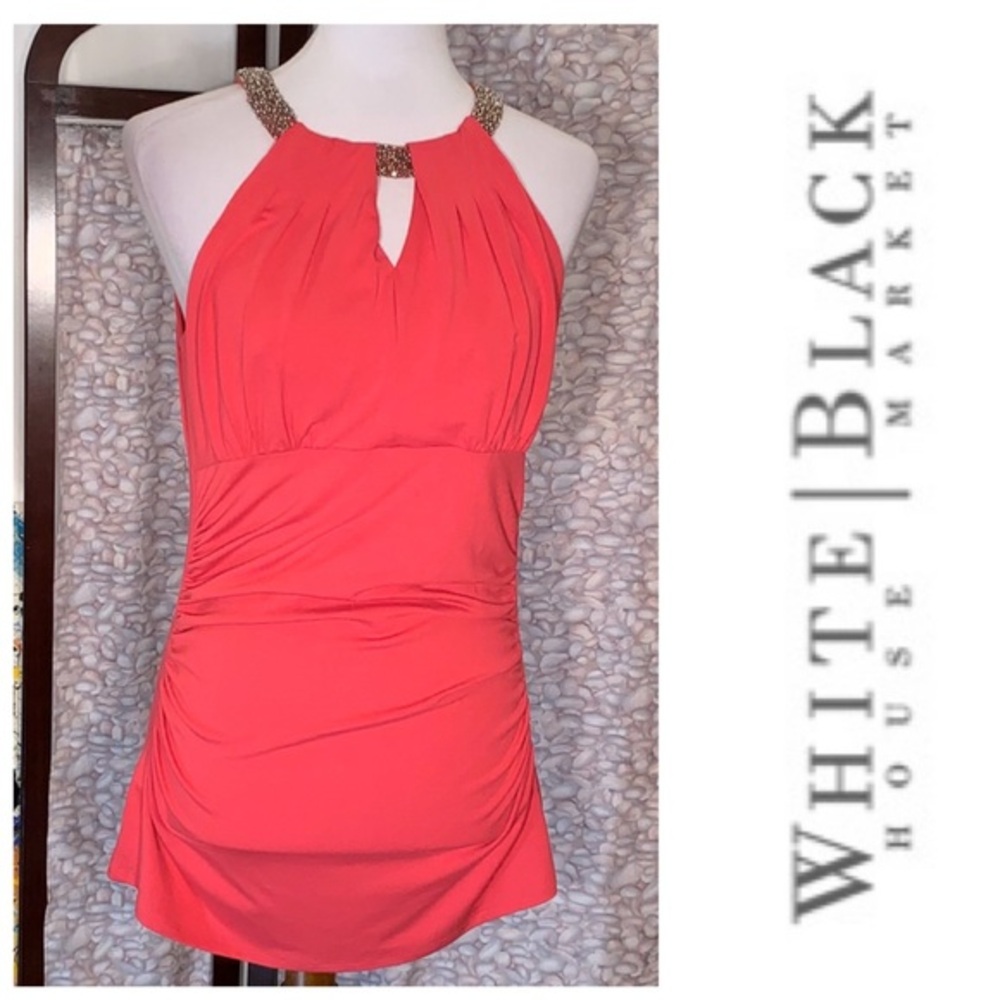 White House Black Market solid pinkish to reddish sleeveless top.